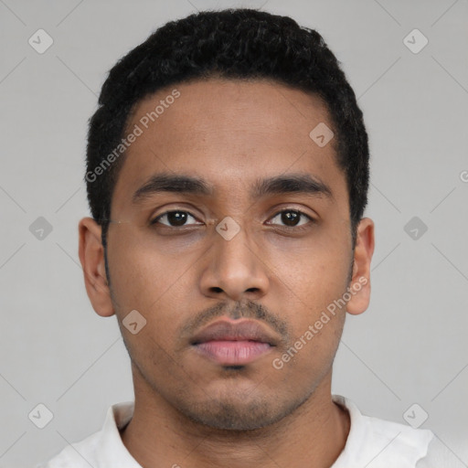 Neutral latino young-adult male with short  black hair and brown eyes