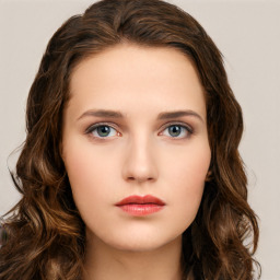 Neutral white young-adult female with long  brown hair and green eyes