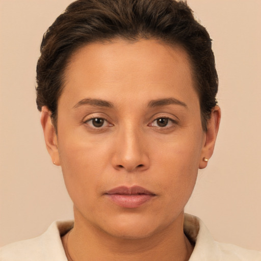 Neutral white young-adult female with short  brown hair and brown eyes