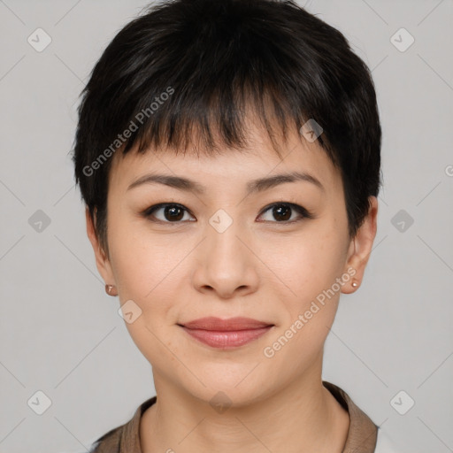 Joyful asian young-adult female with short  brown hair and brown eyes