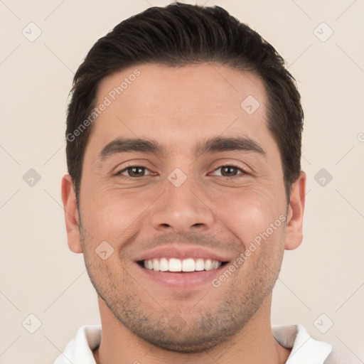 Joyful white young-adult male with short  brown hair and brown eyes