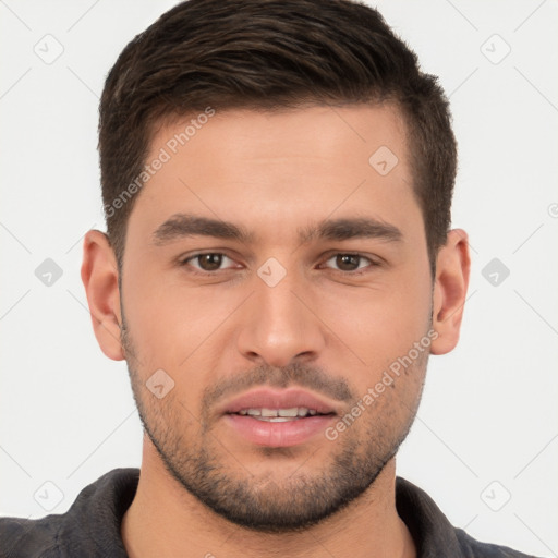 Joyful white young-adult male with short  brown hair and brown eyes