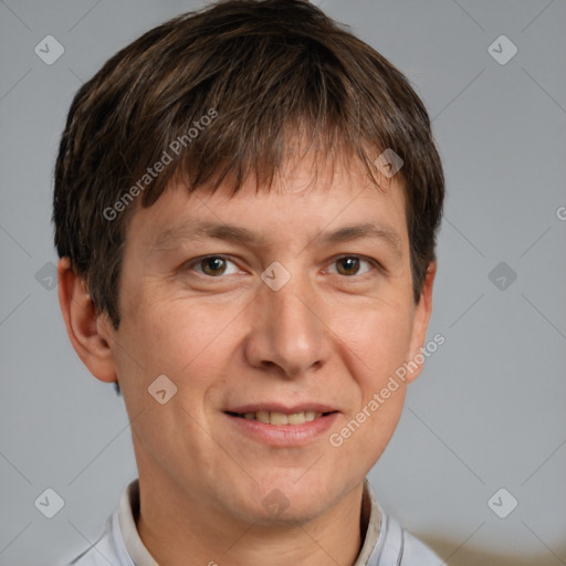 Joyful white adult male with short  brown hair and grey eyes