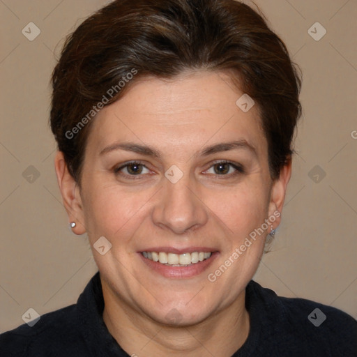 Joyful white adult female with short  brown hair and brown eyes