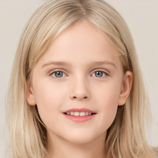 Joyful white child female with long  brown hair and blue eyes