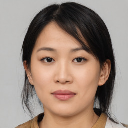 Neutral asian young-adult female with medium  brown hair and brown eyes