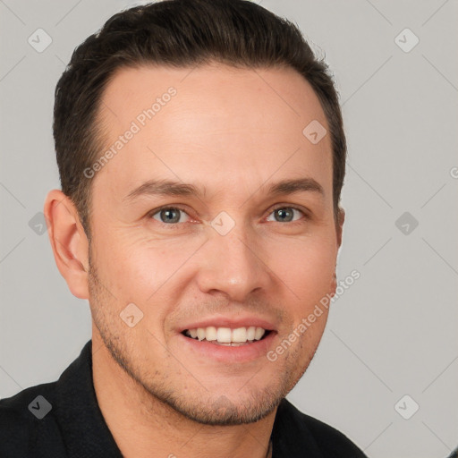 Joyful white young-adult male with short  brown hair and brown eyes