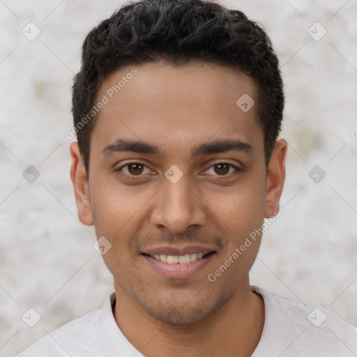 Joyful latino young-adult male with short  brown hair and brown eyes