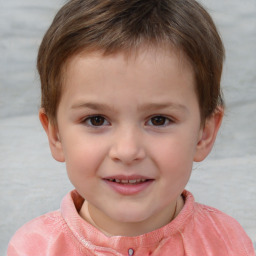 Joyful white child male with short  brown hair and brown eyes