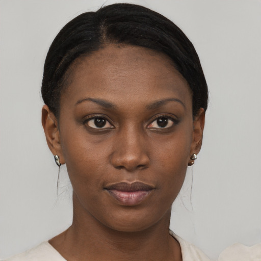 Neutral black young-adult female with short  black hair and brown eyes