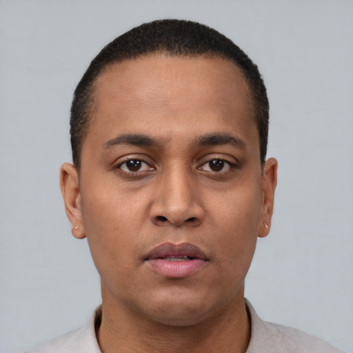 Neutral black young-adult male with short  brown hair and brown eyes