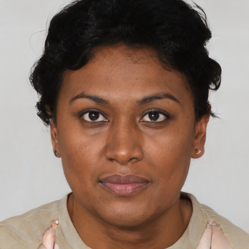Neutral latino young-adult female with short  brown hair and brown eyes