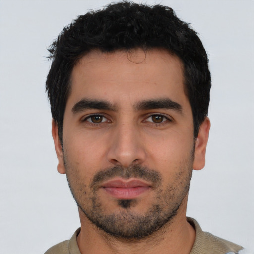 Neutral latino young-adult male with short  black hair and brown eyes