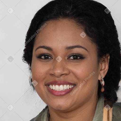 Joyful black young-adult female with medium  brown hair and brown eyes