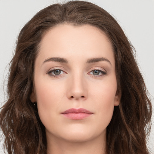 Neutral white young-adult female with long  brown hair and brown eyes