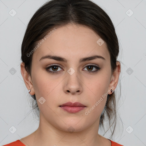 Neutral white young-adult female with medium  brown hair and brown eyes