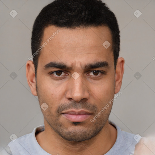 Neutral latino young-adult male with short  black hair and brown eyes