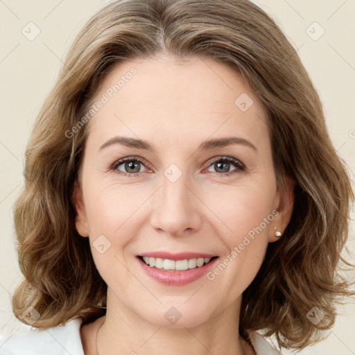 Joyful white young-adult female with medium  brown hair and green eyes