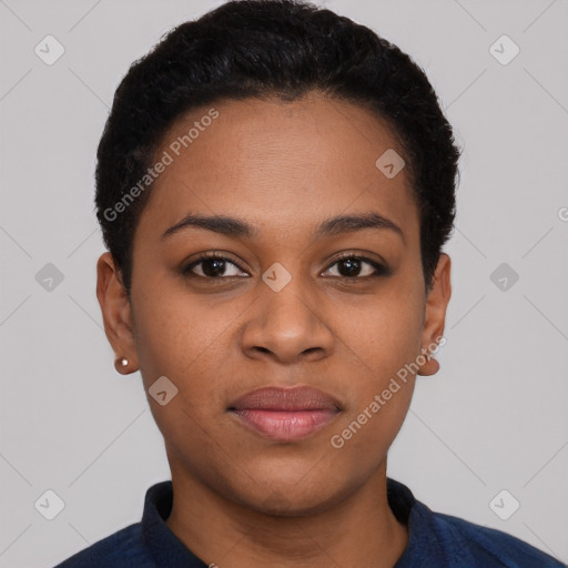 Joyful black young-adult female with short  black hair and brown eyes