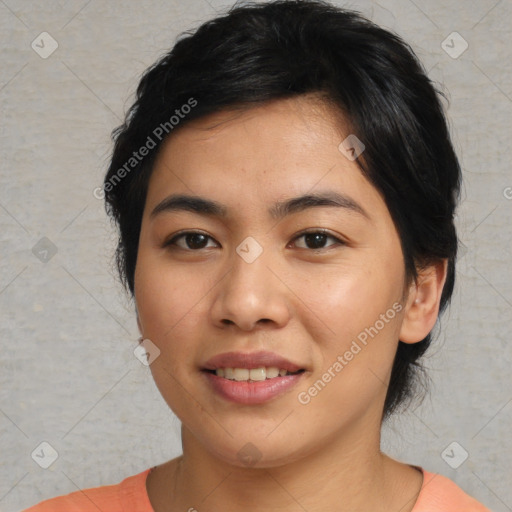 Joyful asian young-adult female with medium  black hair and brown eyes