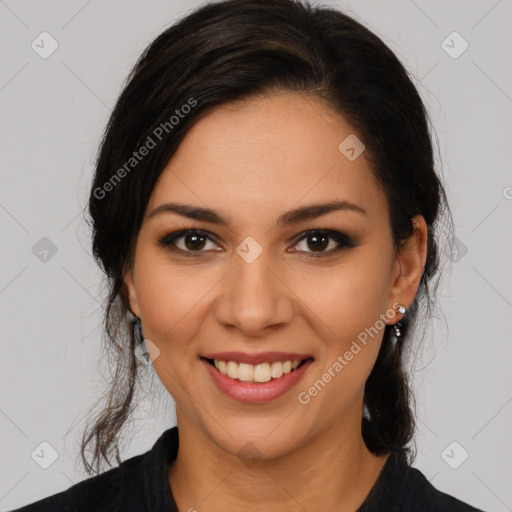 Joyful latino young-adult female with long  brown hair and brown eyes