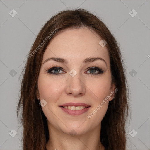 Joyful white young-adult female with long  brown hair and grey eyes