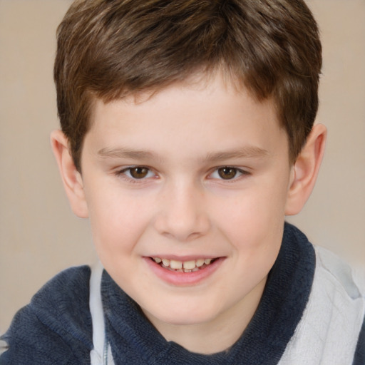 Joyful white child male with short  brown hair and brown eyes