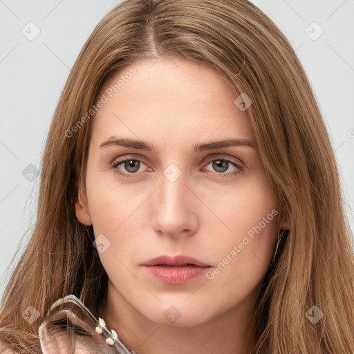 Neutral white young-adult female with long  brown hair and brown eyes