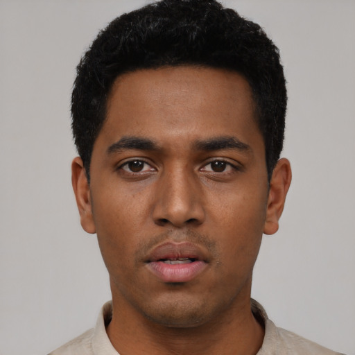 Neutral black young-adult male with short  black hair and brown eyes