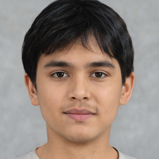Neutral asian child male with short  brown hair and brown eyes