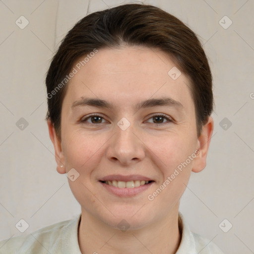 Joyful white young-adult female with short  brown hair and brown eyes