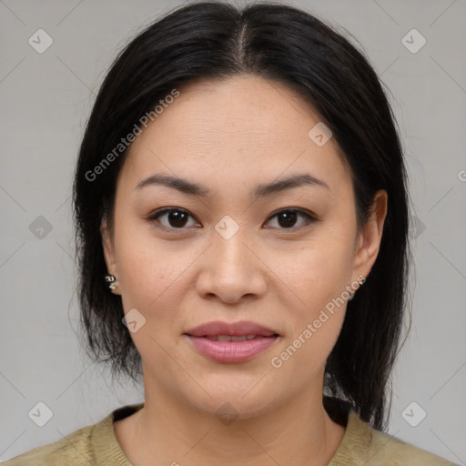 Joyful asian young-adult female with medium  brown hair and brown eyes