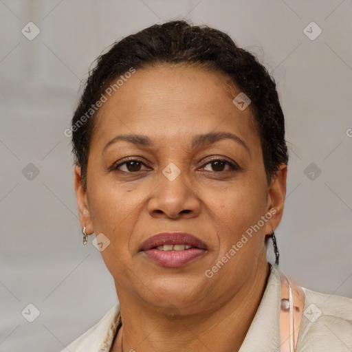 Joyful black adult female with short  brown hair and brown eyes