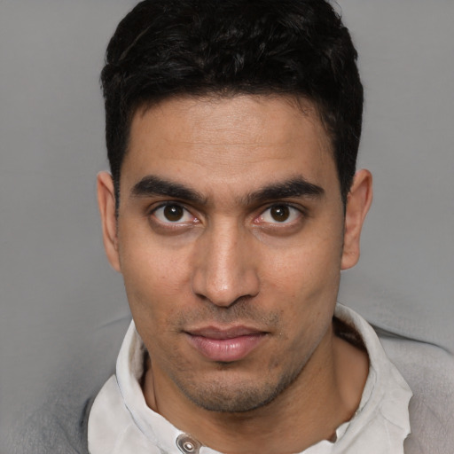 Neutral white young-adult male with short  brown hair and brown eyes