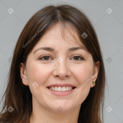 Joyful white young-adult female with long  brown hair and brown eyes