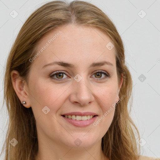 Joyful white young-adult female with long  brown hair and green eyes