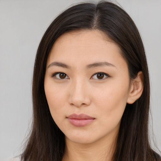Neutral asian young-adult female with long  brown hair and brown eyes