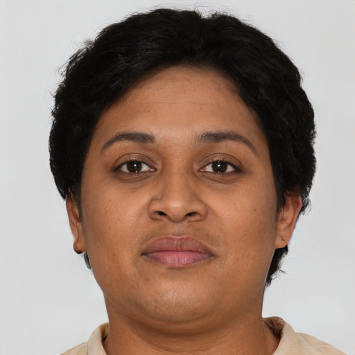 Neutral black adult female with short  brown hair and brown eyes