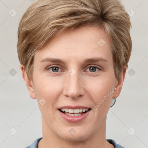 Joyful white young-adult female with short  brown hair and grey eyes