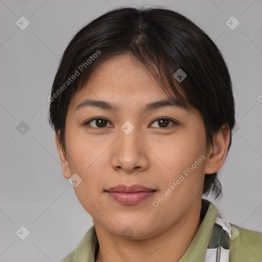 Joyful asian young-adult female with medium  brown hair and brown eyes