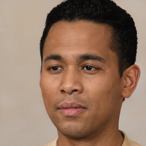 Neutral latino young-adult male with short  black hair and brown eyes