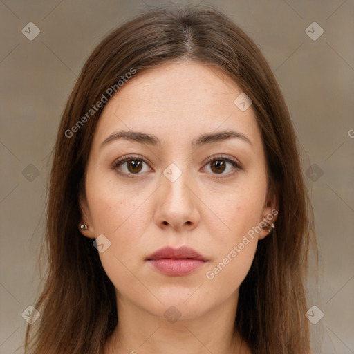 Neutral white young-adult female with long  brown hair and brown eyes