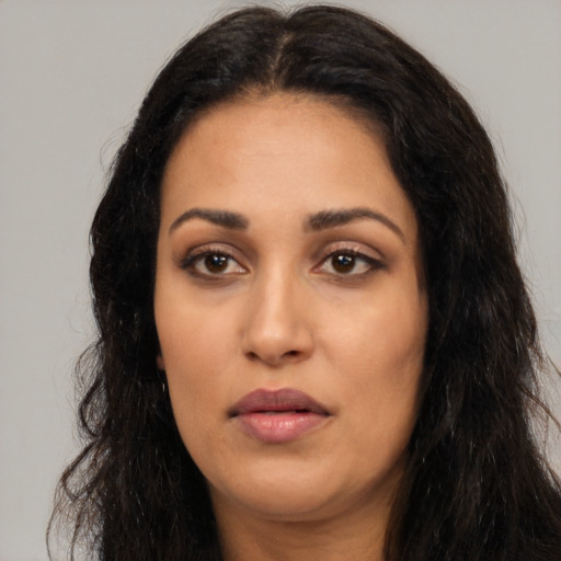 Neutral white young-adult female with long  black hair and brown eyes
