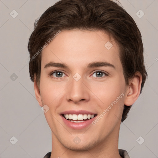 Joyful white young-adult female with short  brown hair and grey eyes