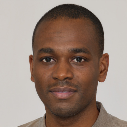 Neutral black young-adult male with short  brown hair and brown eyes