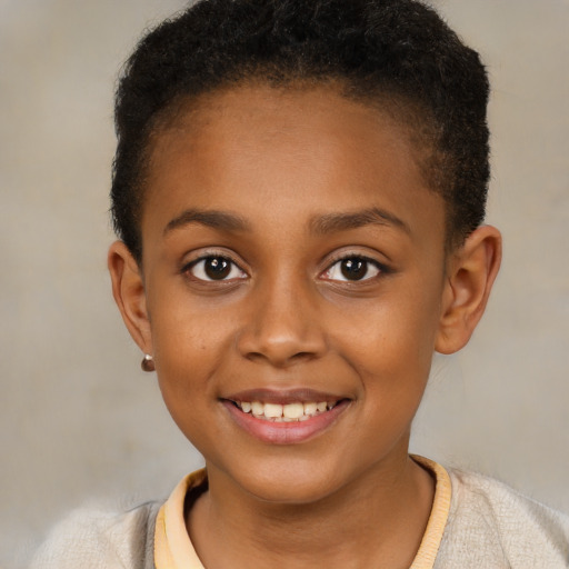 Joyful black child female with short  brown hair and brown eyes