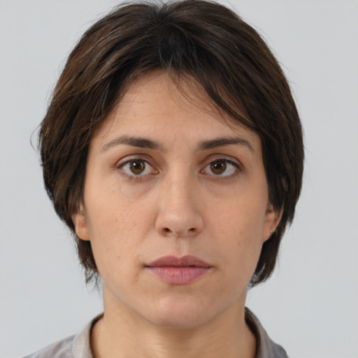 Neutral white adult female with medium  brown hair and brown eyes