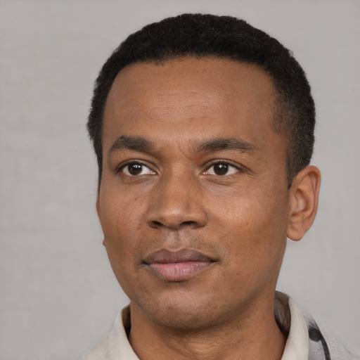 Neutral latino adult male with short  black hair and brown eyes