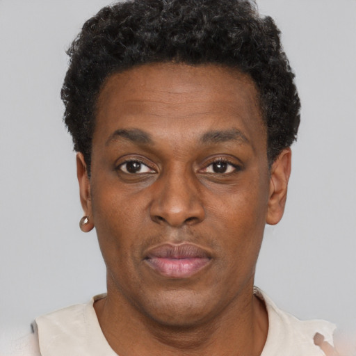 Neutral black adult male with short  brown hair and brown eyes