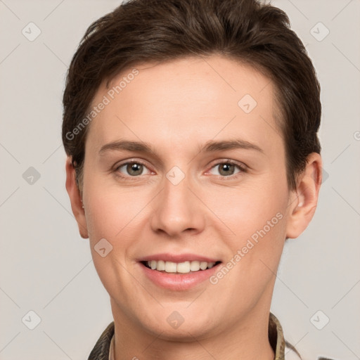 Joyful white young-adult female with short  brown hair and grey eyes